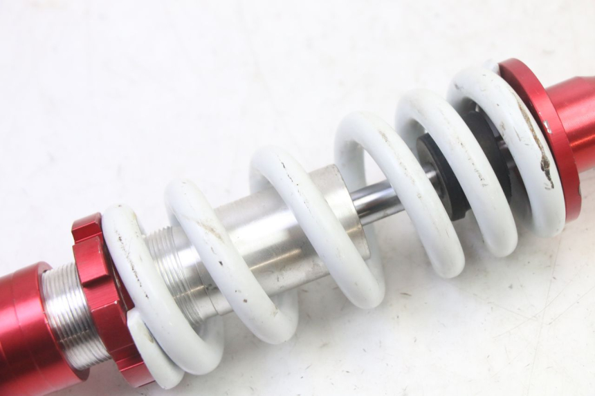 photo de Tylne amortyzatory LONCIN DIRT BIKE 125 - Zbliżenie techniczne