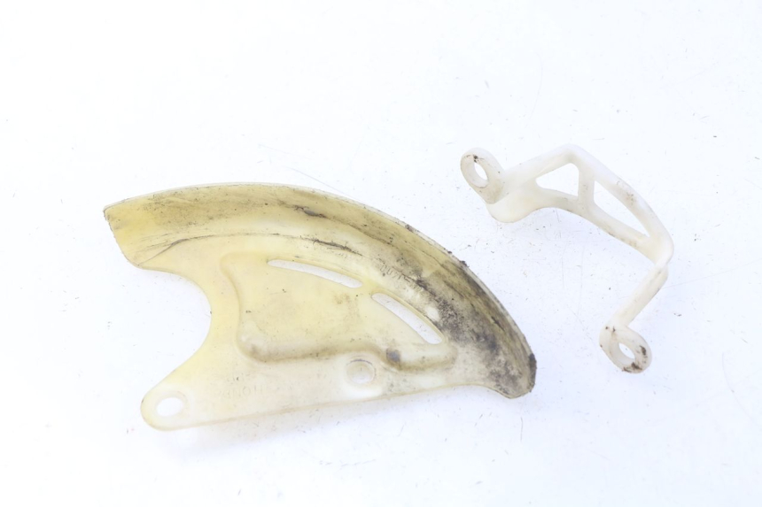 photo de OSŁONA TARCZY HAMULCOWEJ HONDA CRF CR-F 450 (2005 - 2008) - Zoom stanu zużycia