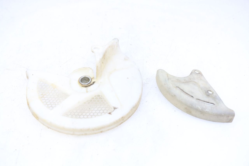 photo de OSŁONA TARCZY HAMULCOWEJ HONDA CRF CR-F 450 (2009 - 2012) - Zoom stanu zużycia