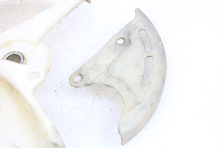 photo de OSŁONA TARCZY HAMULCOWEJ HONDA CRF CR-F 450 (2009 - 2012) - Zbliżenie techniczne