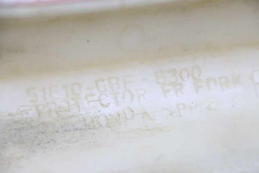 photo de OSŁONA WIDEŁEK HONDA CR 85 (2003 - 2007) - Szczegół części