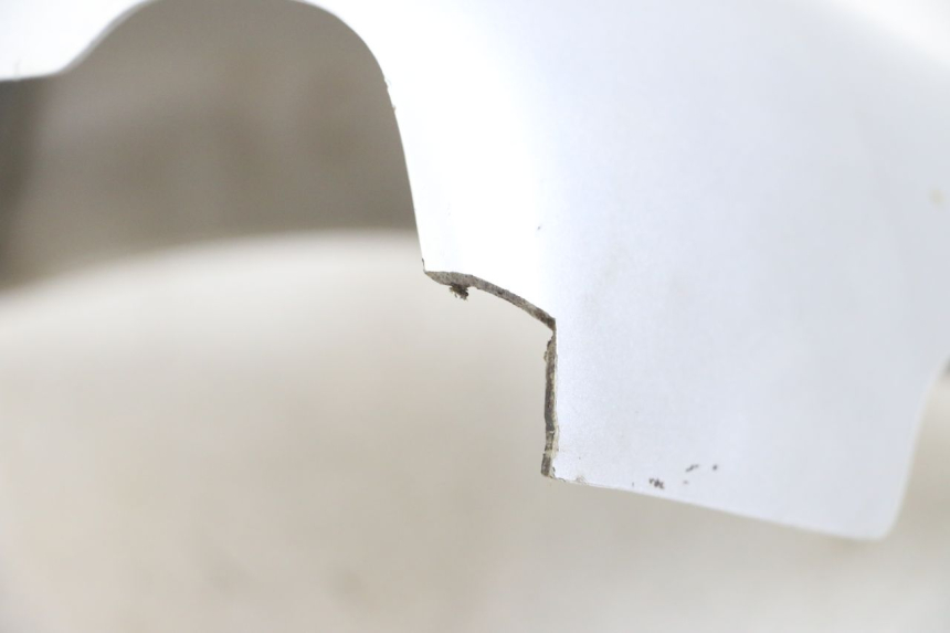 photo de OSŁONA POD SIEDZENIEM PRAWA APRILIA CLASSIC 125 (1995 - 2001) - Zoom stanu zużycia