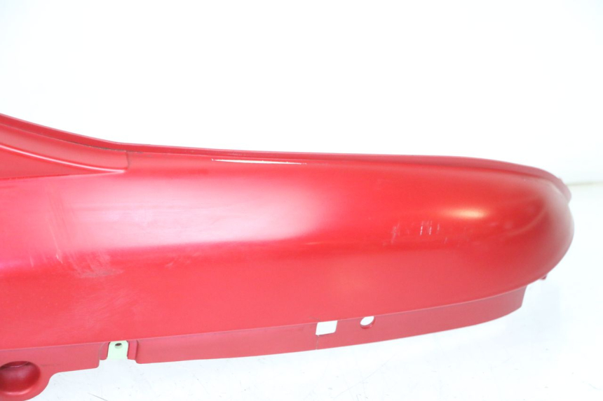 photo de OSŁONA POD SIODŁEM PRAWA PEUGEOT DJANGO 4T 50 (2014 - 2019) - Kontrola wizualna