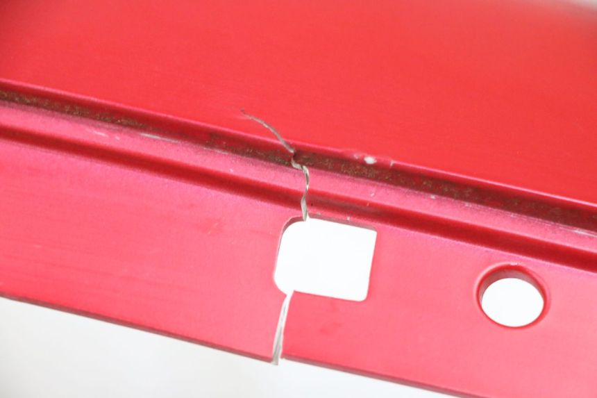 photo de OSŁONA POD SIODŁEM PRAWA PEUGEOT DJANGO 4T 50 (2014 - 2019) - Zoom stanu zużycia