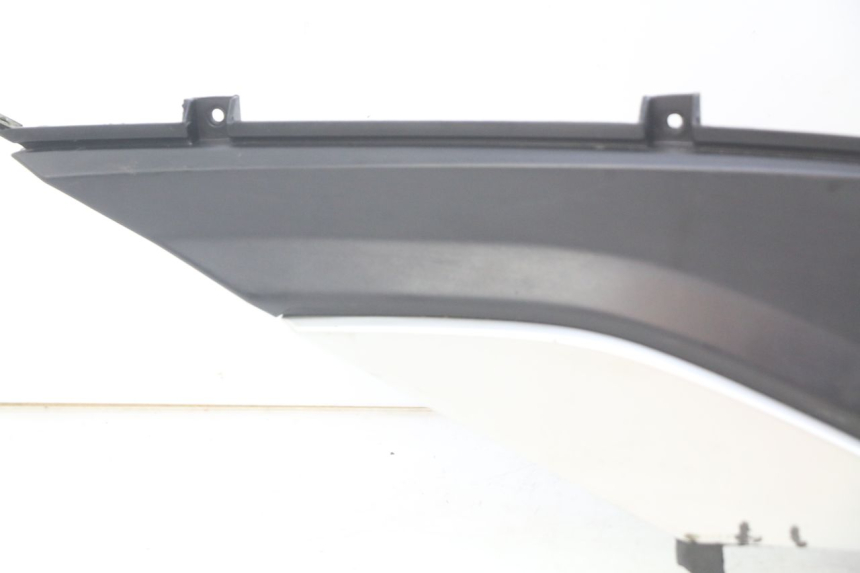 photo de OSŁONA POD SIODŁEM PRAWA TNT MOTOR GRIDO 2T 50 (2010 - 2019) - Stan powierzchni