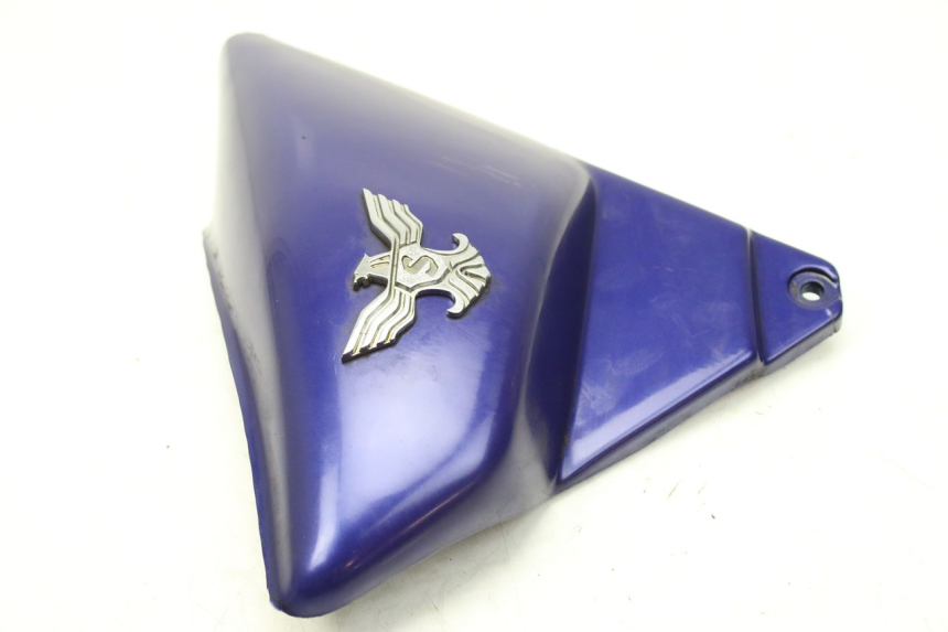 photo de OSŁONA POD SIODŁEM PRAWA SYM HUSKY 125 (1999 - 2005) - Zoom stanu zużycia