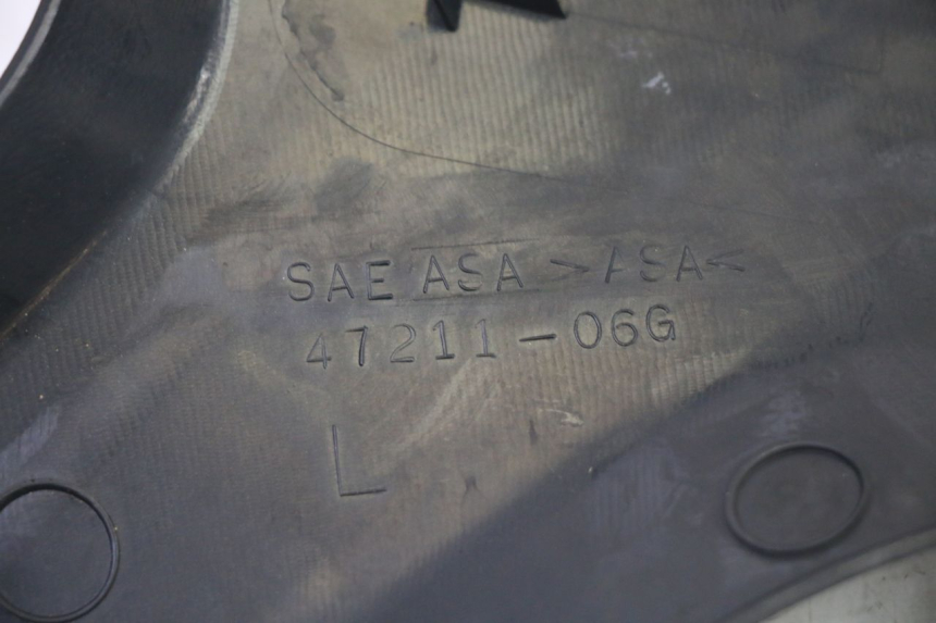 photo de OSŁONA POD LEWYM SIEDZENIEM SUZUKI DL V STROM 1000 (2002 - 2007) - Stan powierzchni