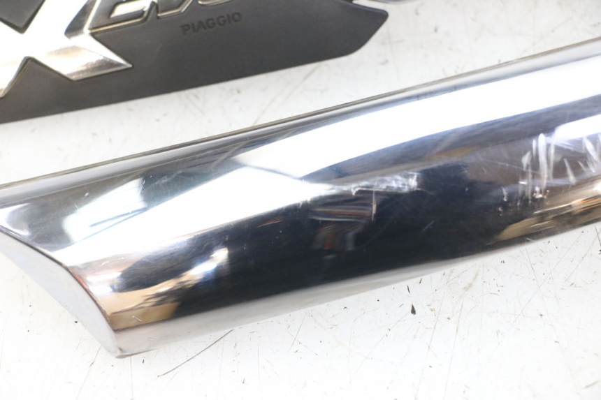 photo de OSŁONA POD SIEDZENIEM PIAGGIO XEVO - X EVO 125 (2007 - 2017) - Stan powierzchni