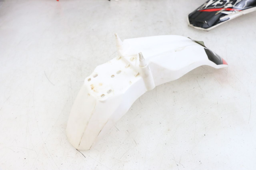 photo de KOMPLETNA OWIEWKA NADWOZIA MINI MX SX 125 - Zbliżenie komponentów