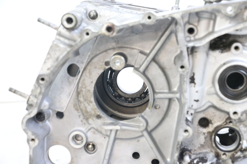 photo de Karter dolny silnika HYOSUNG GV AQUILA 125 (2000 - 2009) - Szczegóły charakterystyczne