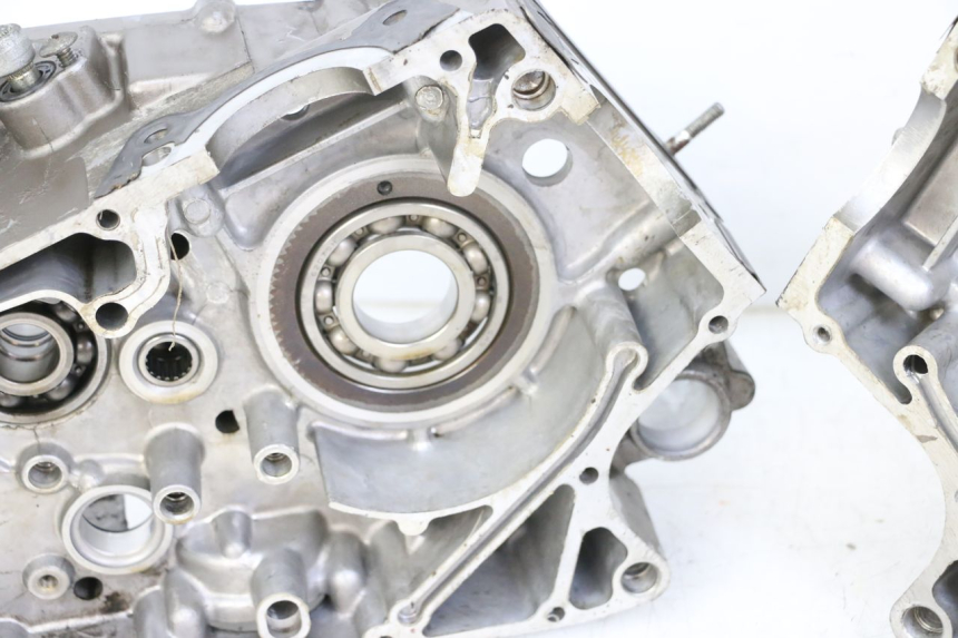 photo de Karter dolny silnika HYOSUNG GTR 125 (2006 - 2008) - Szczegóły charakterystyczne