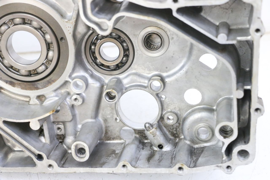 photo de Karter dolny silnika HYOSUNG GTR 125 (2006 - 2008) - Zbliżenie komponentów