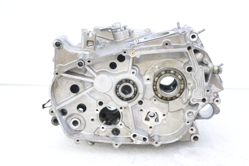 photo de Karter dolny silnika HYOSUNG GTR 125 (2006 - 2008) - Zbliżenie techniczne