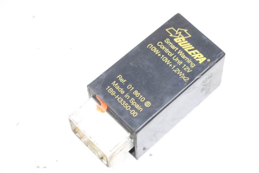 photo de PRZEKAŹNIK KIERUNKOWSKAZU YAMAHA XMAX X-MAX 125 (2006 - 2009) - Zbliżenie techniczne