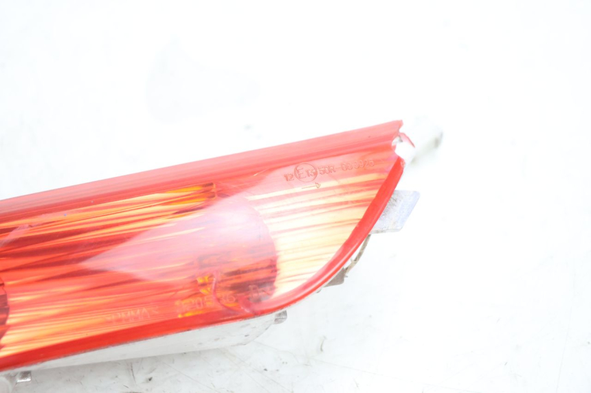 photo de PRAWA TYLNA KIERUNKOWSKAZ PIAGGIO X8 STREET 125 (2006 - 2007) - Zoom stanu zużycia