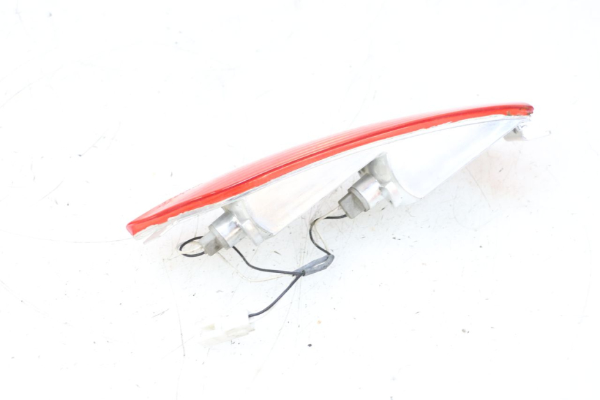 photo de LEWY TYLNY KIERUNKOWSKAZ PIAGGIO X8 125 (2004 - 2007) - Stan powierzchni