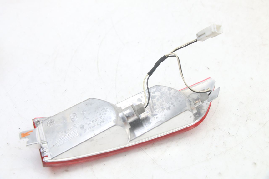 photo de LEWY TYLNY KIERUNKOWSKAZ PIAGGIO XEVO - X EVO 125 (2007 - 2017) - Stan powierzchni