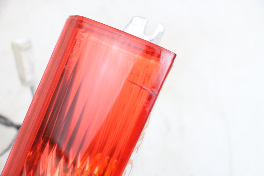 photo de KIERUNKOWSKAZ TYLNY PIAGGIO XEVO - X EVO 125 (2007 - 2017) - Szczegół części