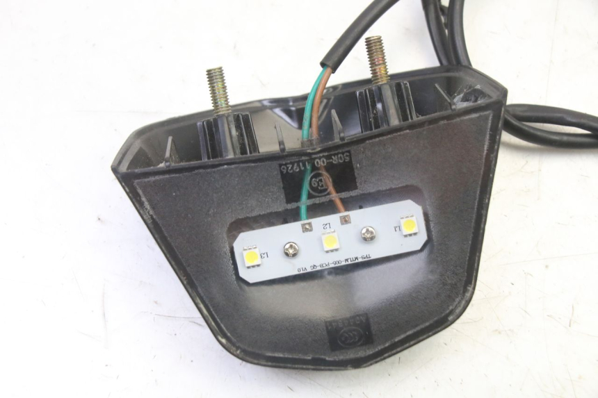 photo de OŚWIETLENIE TABLICY REJESTRACYJNEJ KIDEN KD125-G 125 (2018 - 2022) - Zoom stanu zużycia