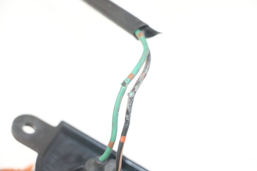 photo de OŚWIETLENIE TABLICY REJESTRACYJNEJ HONDA NTV DEAUVILLE ABS 700 (2007 - 2016) - Zoom stanu zużycia