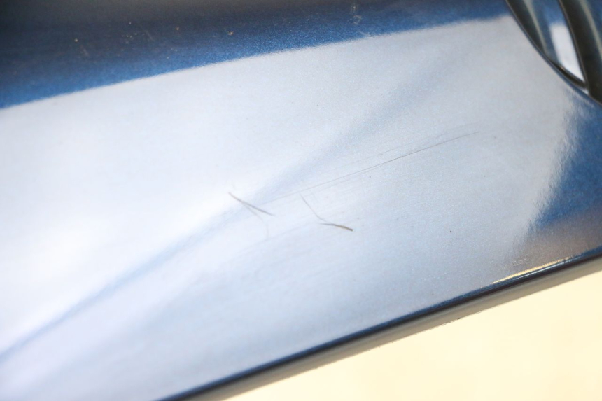 photo de GÓRNA PRZEDNIA MASKOWNICA PIAGGIO VESPA LX 150 (2005 - 2013) - Zoom stanu zużycia