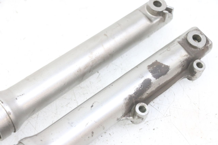 photo de OSŁONA WIDEŁEK ZAWIESZENIA PRZEDNIEGO SYM FIDDLE 2 S 125 (2012 - 2014) - Stan powierzchni