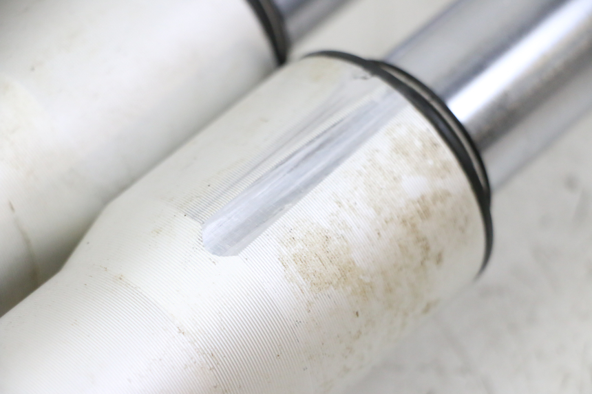 photo de OSŁONA WIDEŁEK AMORTYZATORA APOLLO RFZ 125 - Struktura - zbliżenie