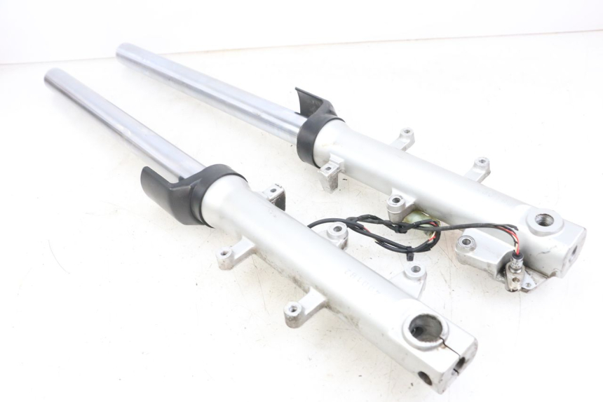 photo de OSŁONA WIDEŁEK AMORTYZATORA KYMCO XCITING 250 (2006 - 2009) - Stan powierzchni