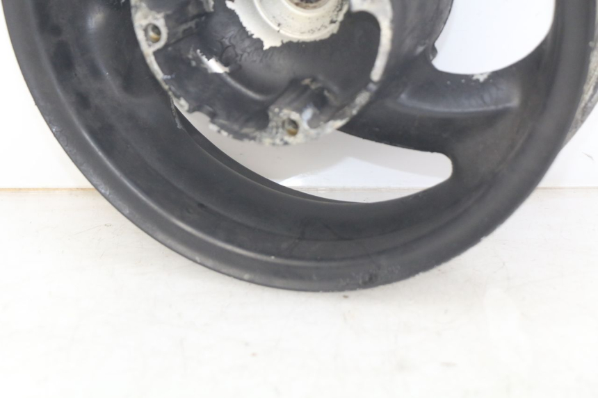 photo de OBRĘCZ TYLNA HONDA FES PANTHEON 125 (2003 - 2007) - Zoom stanu zużycia