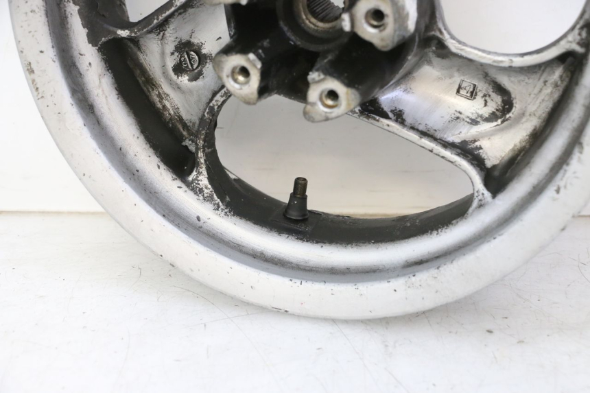 photo de OBRĘCZ TYLNA KYMCO GRAND DINK 125 (2002 - 2007) - Zoom stanu zużycia