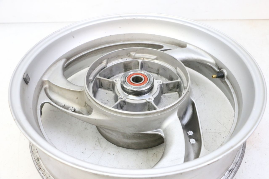 photo de OBRĘCZ TYLNA HONDA NTV DEAUVILLE 650 (2001 - 2006) - Szczegół części