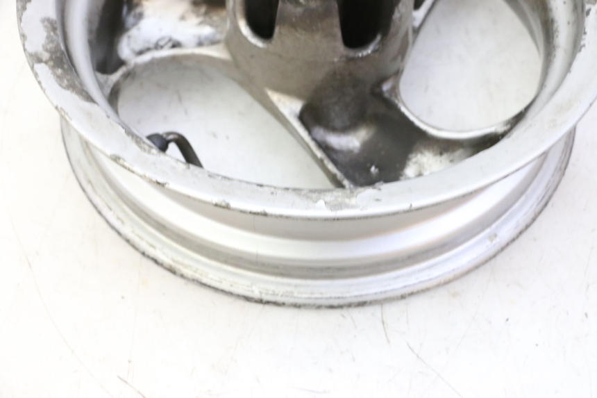 photo de OBRĘCZ PRZEDNIA KYMCO GRAND DINK 125 (2002 - 2007) - Struktura - zbliżenie