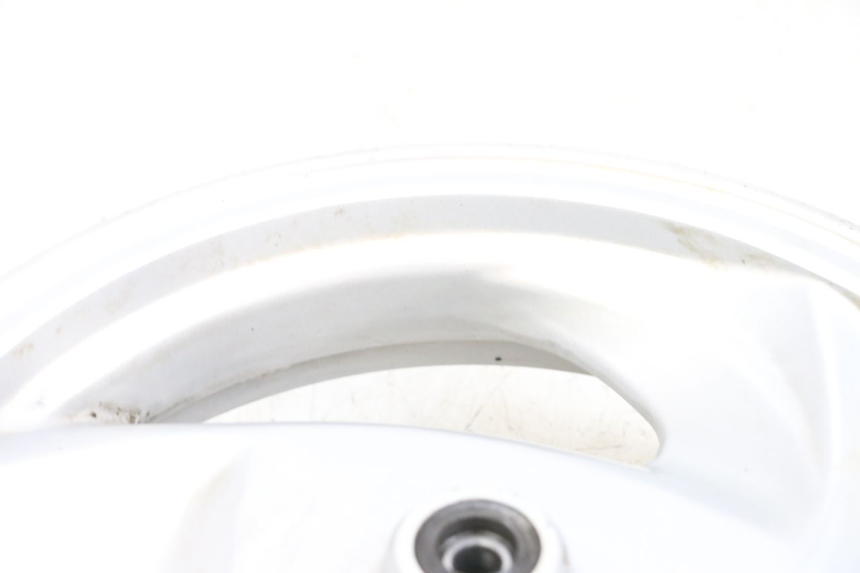 photo de OBRĘCZ PRZEDNIA SYM GTS EVO 125 (2009 - 2013) - Zoom stanu zużycia