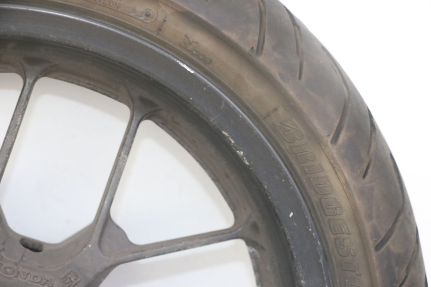 photo de OBRĘCZ PRZEDNIA I OPONA HONDA FORZA ABS 300 (2013 - 2017) - Oznaczenia i referencje