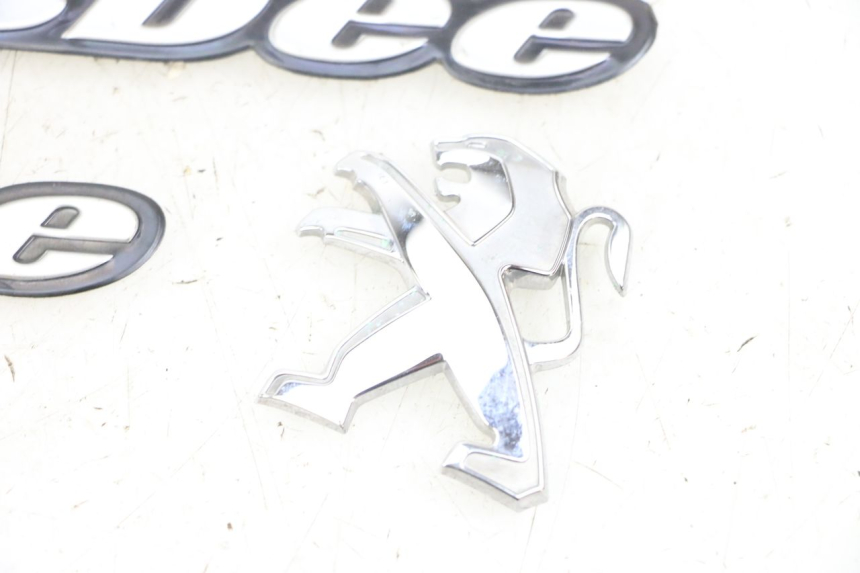 photo de LOGO MARKI PEUGEOT KISBEE 4T 50 (2010 - 2017) - Zoom stanu zużycia