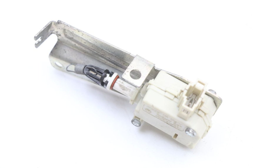 photo de SILNIK OTWIERANIA KUFERKA PIAGGIO X10 125 (2012 - 2017) - Stan powierzchni