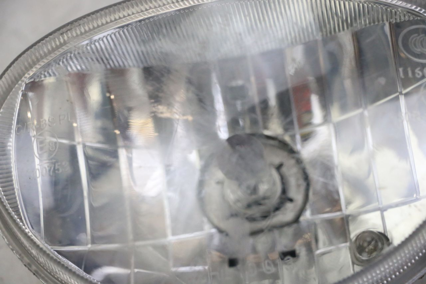 photo de REFLEKTOR PRZEDNI DAELIM BESBI 125 (2007 - 2008) - Zbliżenie komponentów