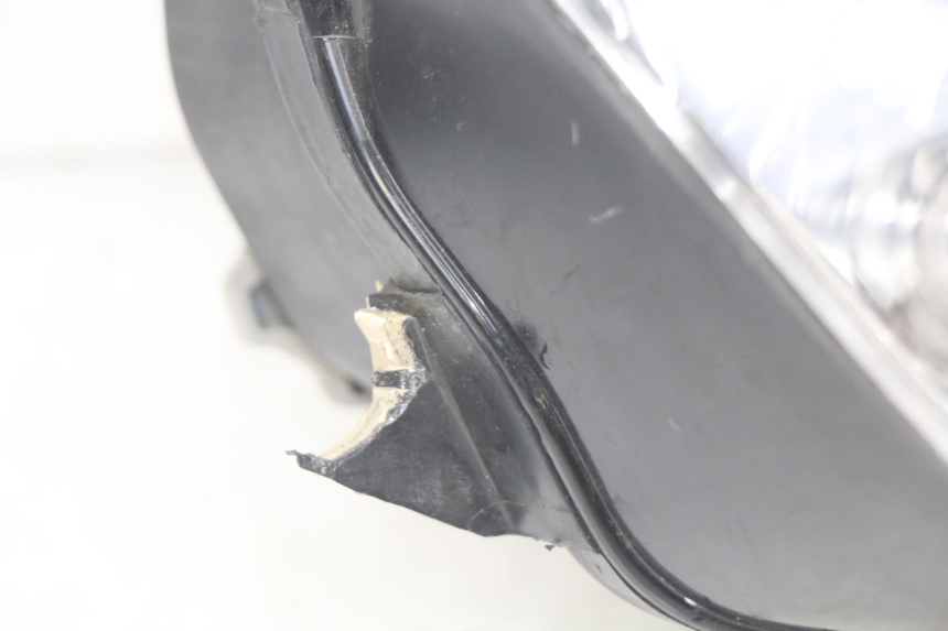 photo de REFLEKTOR PRZEDNI HONDA FES PANTHEON 2T 125 (1998 - 2002) - Widok z bliska