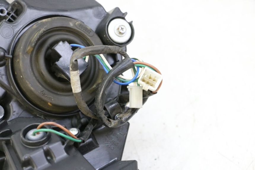 photo de LEWY PRZEDNI REFLEKTOR SYM JOYMAX 125 (2010 - 2017) - Zoom stanu zużycia