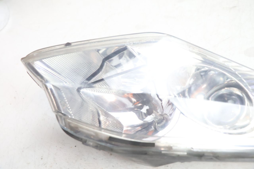photo de LEWY PRZEDNI REFLEKTOR PEUGEOT SATELIS 125 (2006 - 2009) - Zoom stanu zużycia