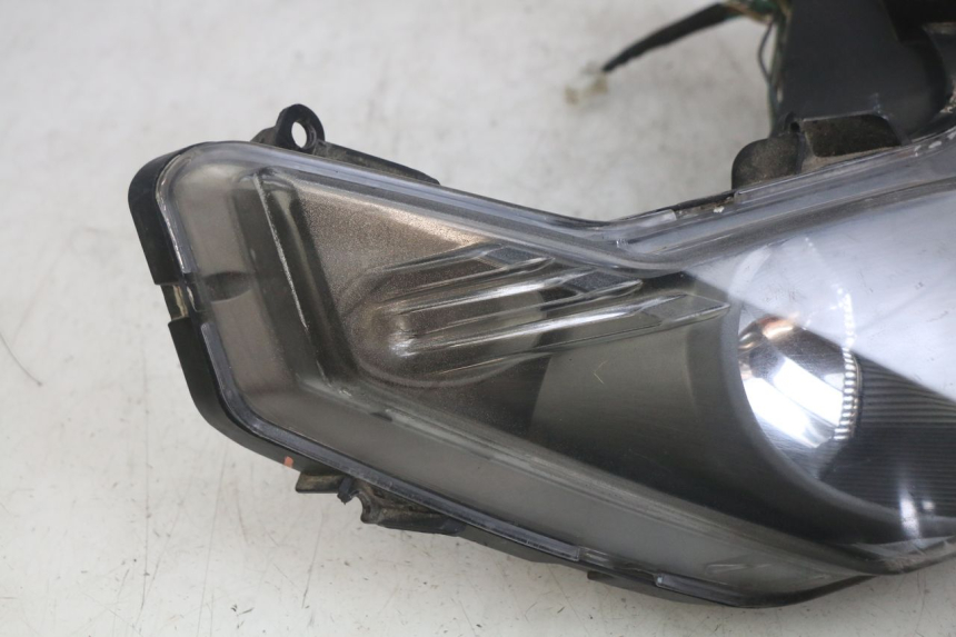 photo de REFLEKTOR PRZEDNI SYM JET SPORT XR 50 (2006 - 2015) - Zoom stanu zużycia