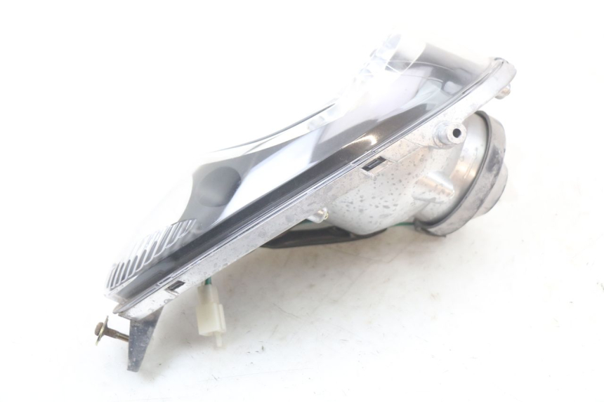 photo de REFLEKTOR PRZEDNI SYM MIO 50 (2011 - 2017) - Stan powierzchni