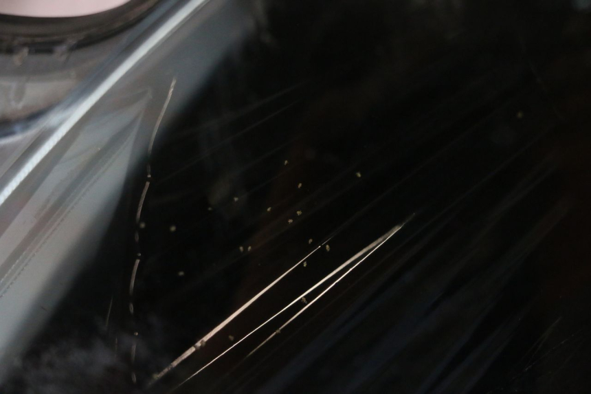 photo de REFLEKTOR PRZEDNI PIAGGIO MP3 125 (2006 - 2014) - Struktura - zbliżenie