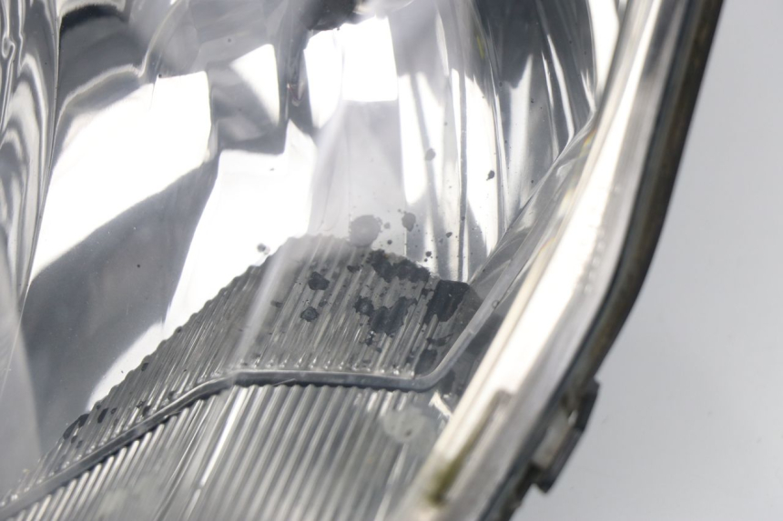 photo de REFLEKTOR PRZEDNI PEUGEOT SATELIS COMPRESSOR K15 125 (2006 - 2009) - Struktura - zbliżenie