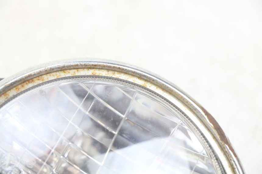 photo de REFLEKTOR PRZEDNI DAELIM VJ ROADWIN FI 125 (2008 - 2017) - Oznaczenia i referencje