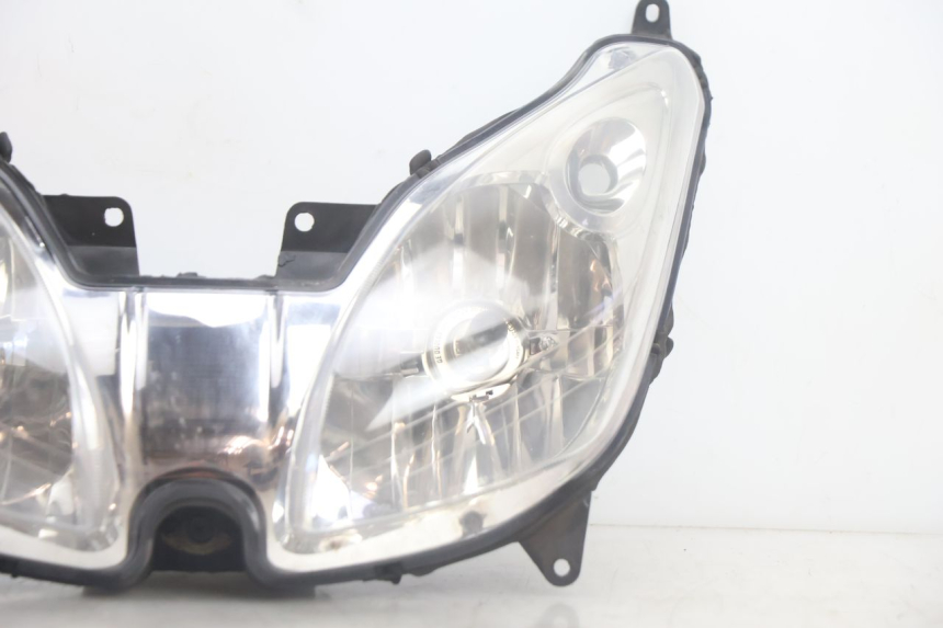 photo de REFLEKTOR PRZEDNI YAMAHA XMAX X-MAX 125 (2006 - 2009) - Zoom stanu zużycia