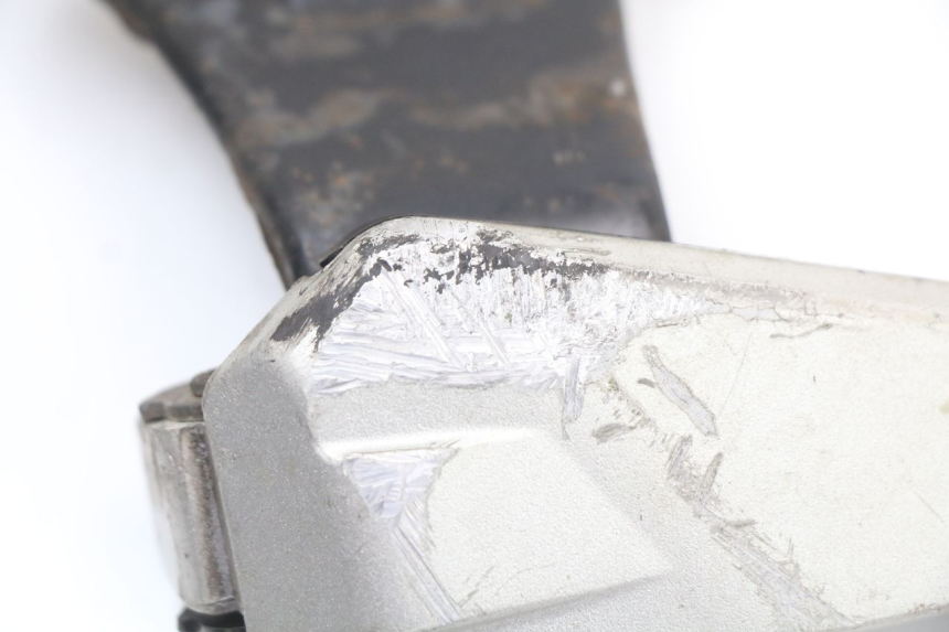 photo de PŁYTKA PODNÓŻKA TYLNA LEWA HONDA SH ABS 125 (2012 - 2017) - Stan powierzchni