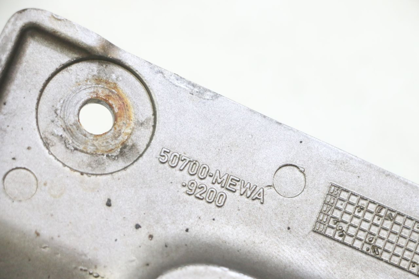 photo de PŁYTKA PODNÓŻKA PRZEDNIA LEWA HONDA NTV DEAUVILLE ABS 700 (2007 - 2016) - Zoom stanu zużycia