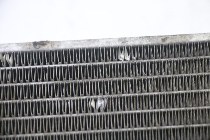 photo de CHŁODNICA KYMCO GRAND DINK 125 (2002 - 2007) - Zoom stanu zużycia