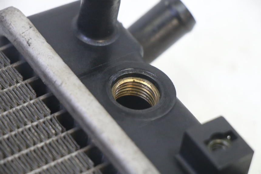 photo de CHŁODNICA KYMCO GRAND DINK 125 (2002 - 2007) - Stan powierzchni